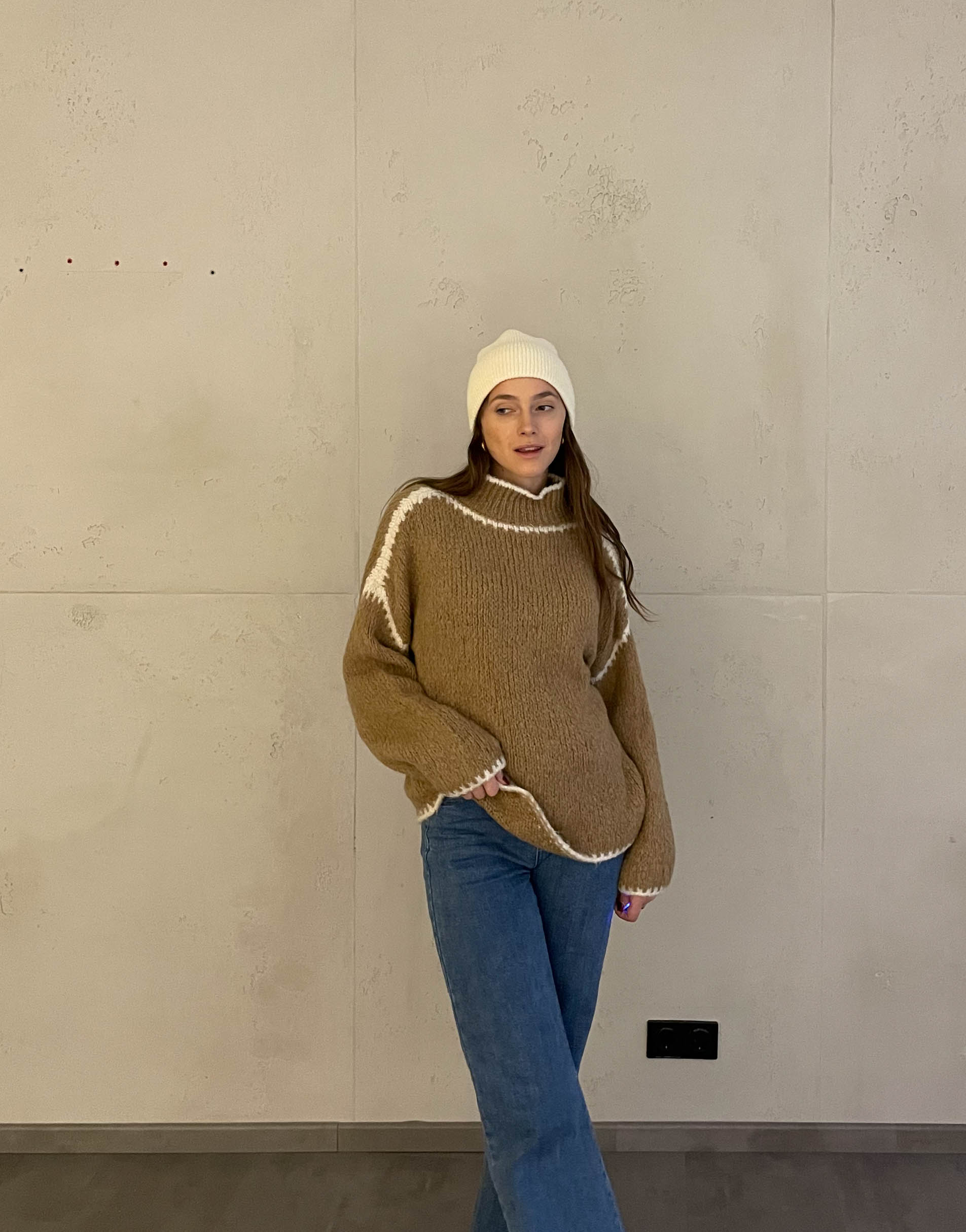 Sweater with contrasting stitching