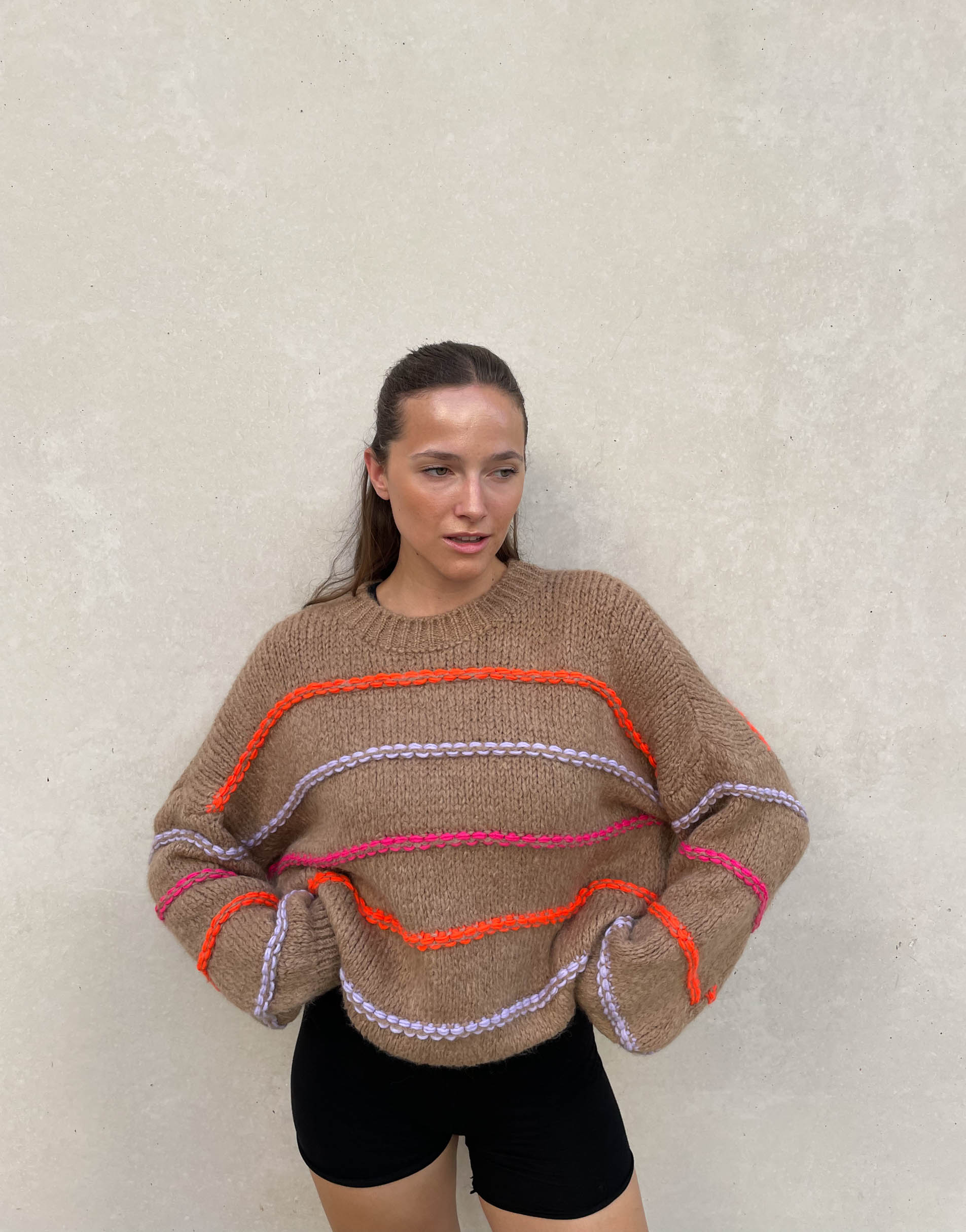 Oversized sweater with neon stitching