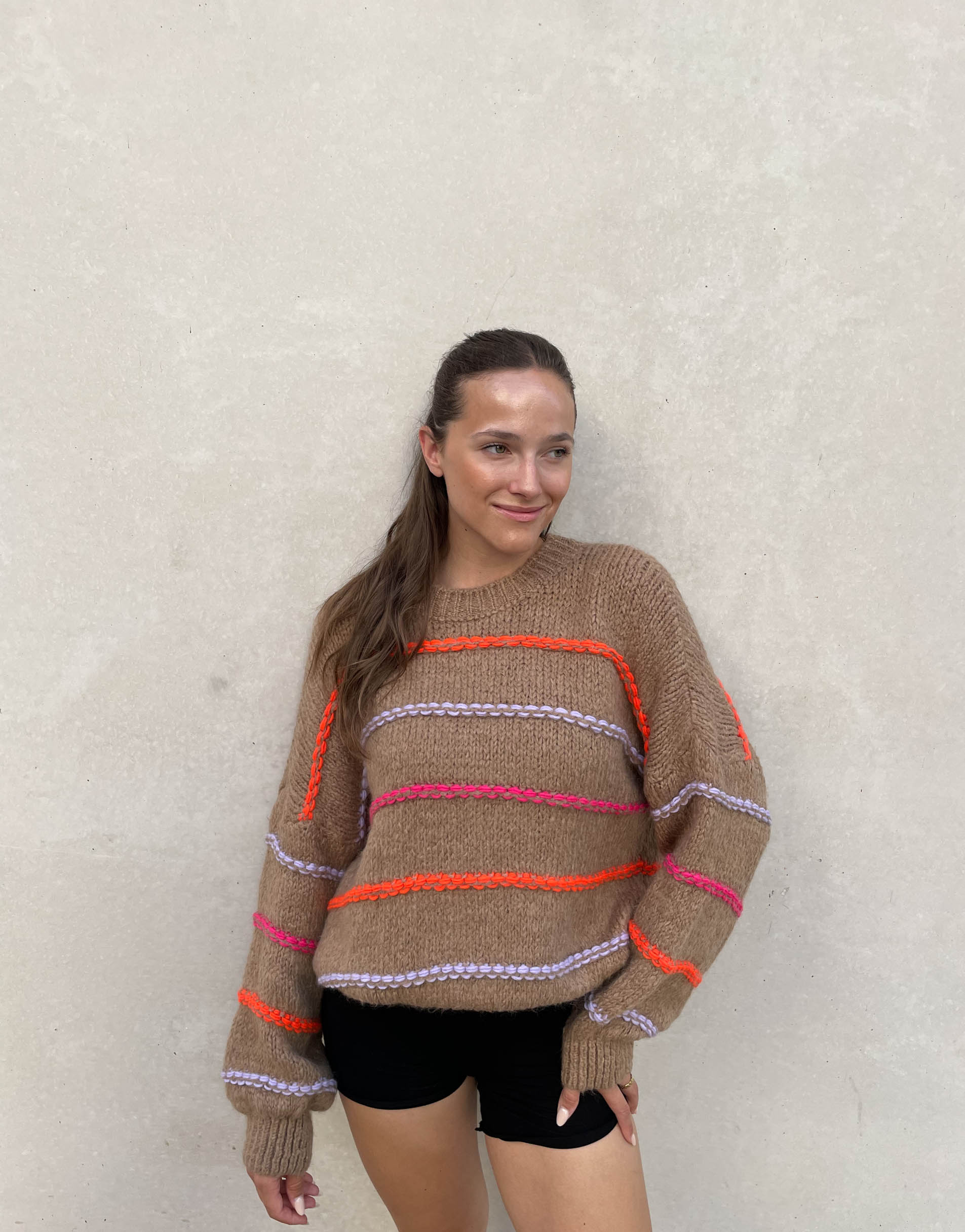 Oversized sweater with neon stitching