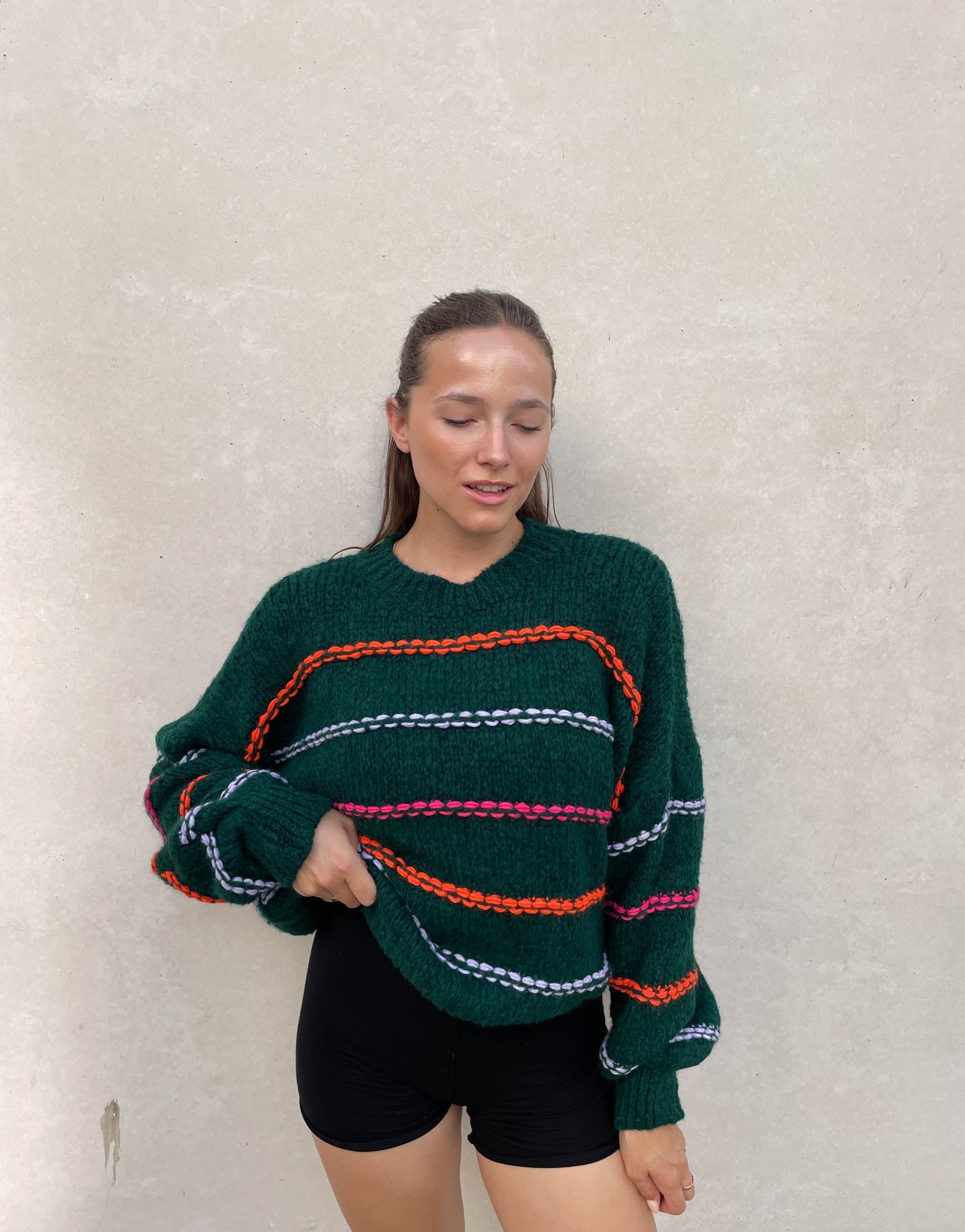 Oversized sweater with neon stitching