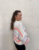 Oversized sweater with neon stitching